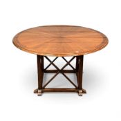 CONTEMPORARY CIRCULAR DINING TABLE, segmented veneered top with pull-out extensions, x frame, 76 (h)