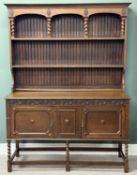 EARLY 20TH CENTURY OAK DRESSER with boarded plate rack back, top shelf with barley twist supports,