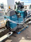 TENNANT RIDE ON FLOOR SCRUBBER