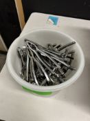 BIN OF STAINLESS NUT CRACKERS