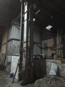 Stainless Steel Belt and Bucket Elevator, approx. 6.7m high, with 2.2kW gearmotor and chain drive.