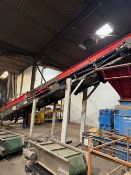 IMRO Inclined Belt Conveyor, on steel support work, with reception hopper. It has an approx.