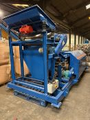Jaykrishna Magnetics Eddy Current Separator, there is a vibrating tray feeder and rotary drum magnet
