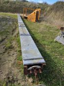 Chain and Flight Conveyor, with troughed case and 300mm wide D shaped HDPE flights. Total length