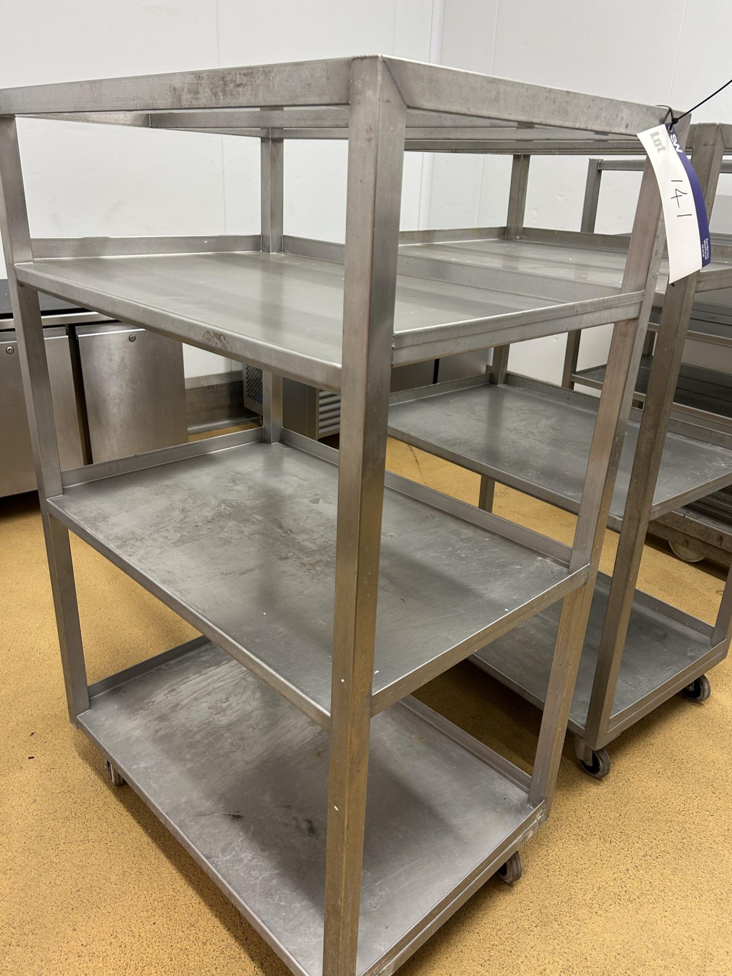 Three Shelf Mobile Rack, approx. 1m x 0.65m x 1.55m high, lift out and loading charge + VAT £20