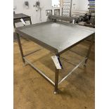 Table, with upstand on three sides, approx. 1.2m x 1.2m x 1m high, lift out and loading charge + VAT