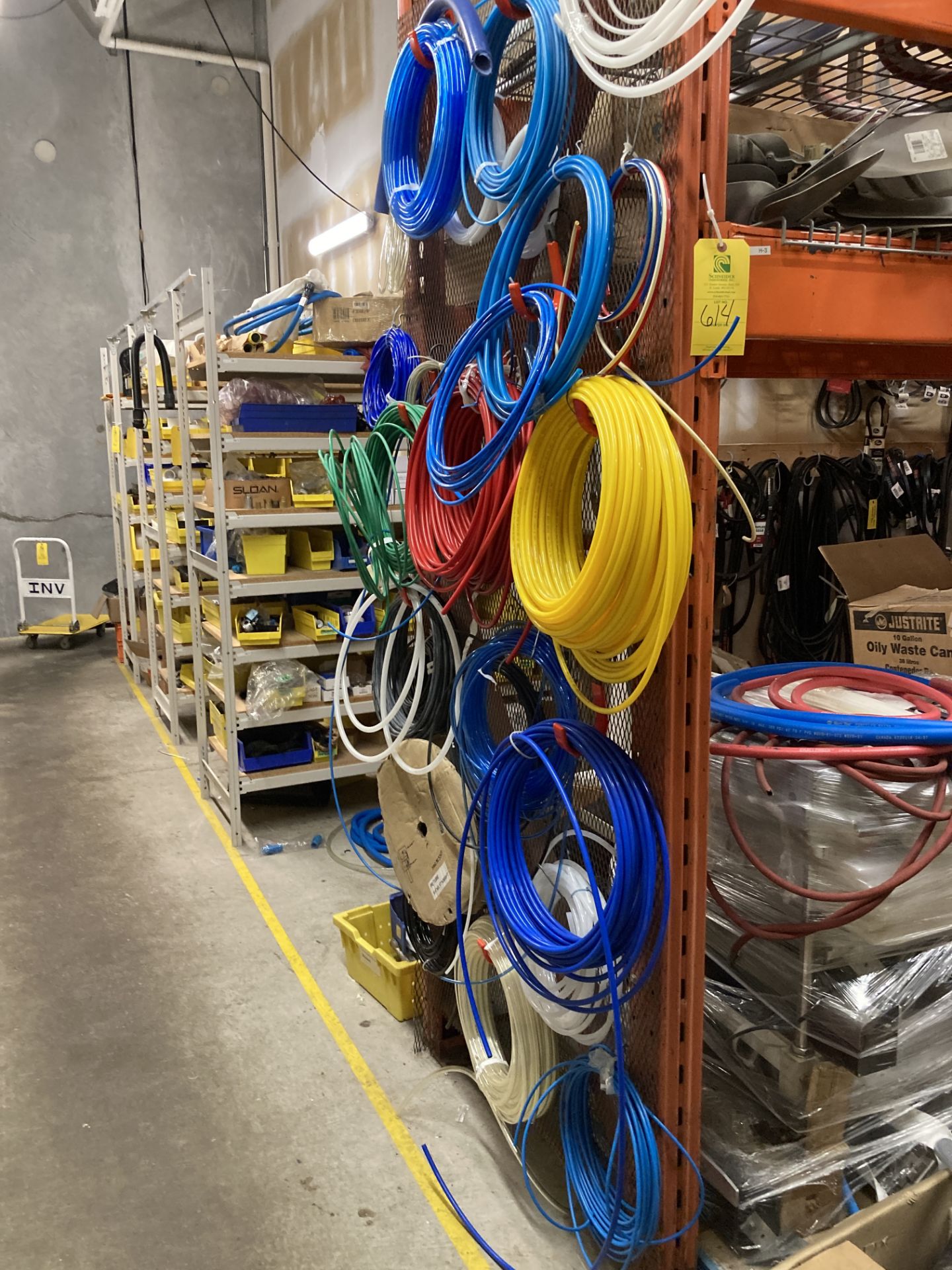 LOT OF pallet racking with contents tubing, hoses, fan blades, gearbox ...
