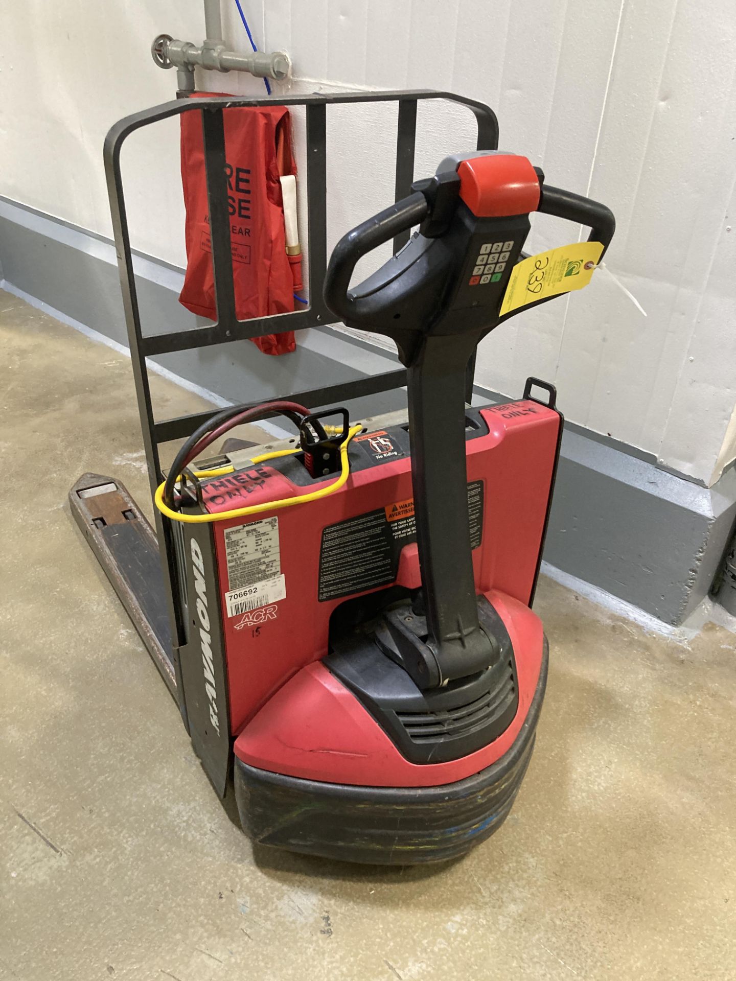 Raymond Rideable Jack Raymond electric pallet jack, model 8210, 24 volt, 4500 lbs max ...