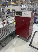 Dynaric DF-117B automatic strapping system, S/N 2486; integrated conveyor, Removal/ Loading Fee:$225