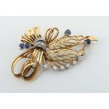 Blütenbrosche mit Steinen um 1960,