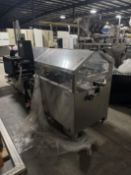 Econoseal cartoner Model Number: 6253 Serial Number: 6473 This machine loads the pouches with prod