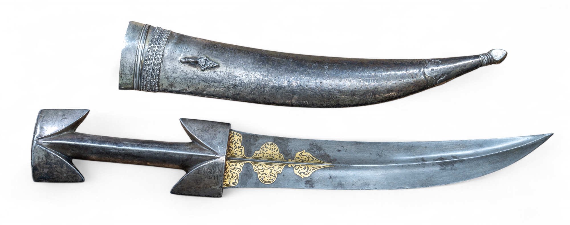 Ottoman, 19th century A silver-clad jambiya. The blade with gold ...