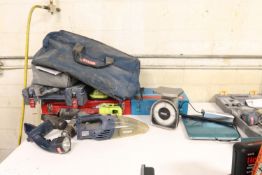 Miscellaneous power tools, tool cases, battery chargers, no battery, and a digital and postage scale
