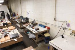 Four wood top work tables, 4' x 8'