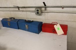 Three toolboxes, empty