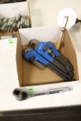 Pizza cutter, ratchet wrench, and three pipe wrenches including one 14", one 12", and one 10"