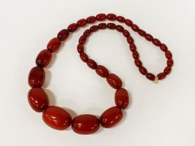 CHERRY BEADED AMBER/BAKELITE NECKLACE - 70 GRAMS APPROX