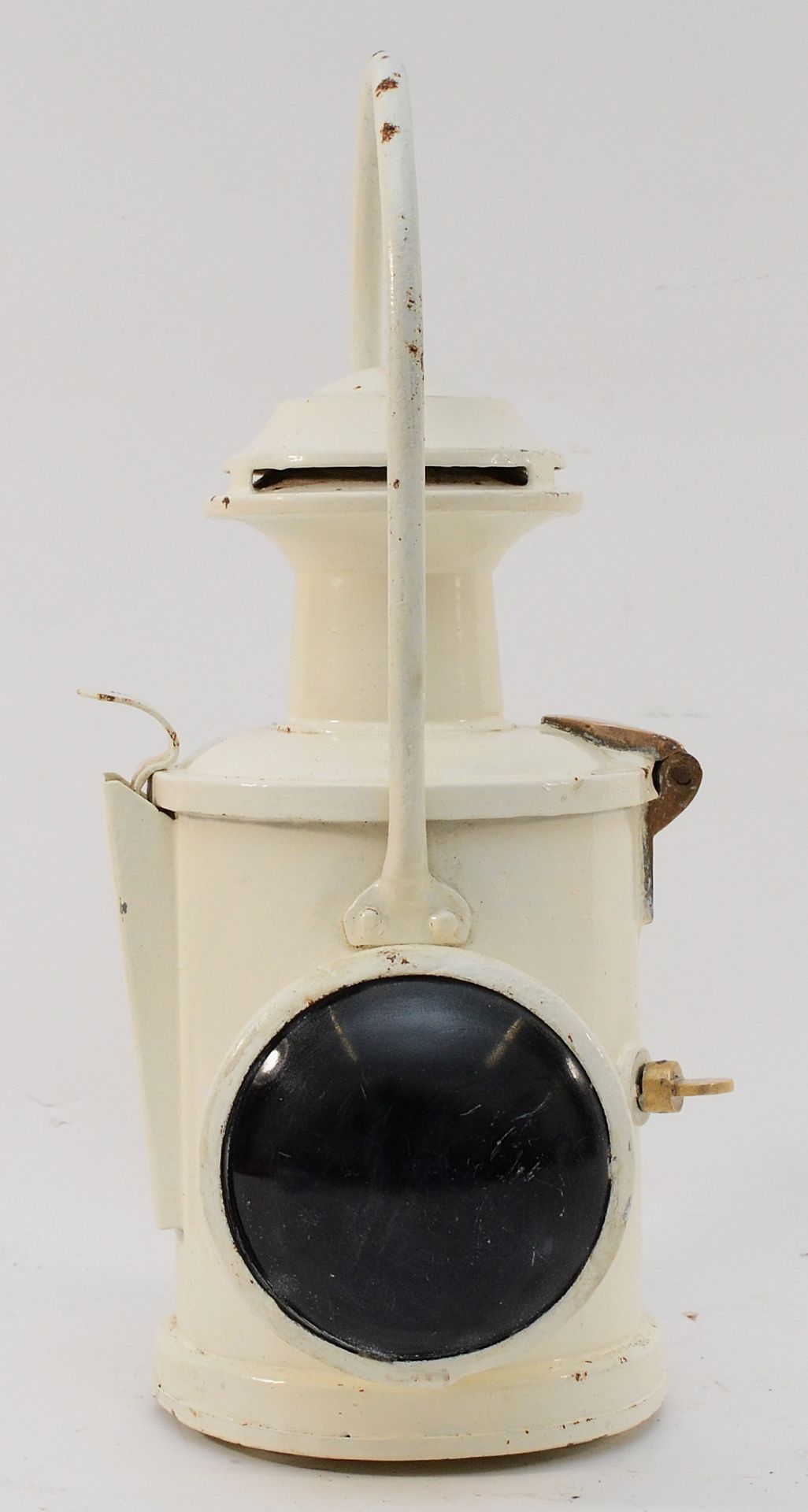 An L.N.E.R head lamp, complete with burner and working red flip-over disc.