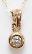 A 9ct gold brilliant cut diamond pendant, stated 0.15ct, on a chain, 1.3g