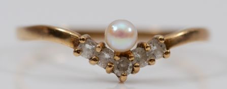 A 9ct gold gemset wishbone ring, London 1986, P, 1g