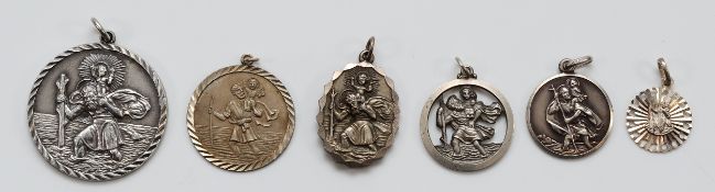 Georg Jensen, a silver St Christopher pendant, London 1972, with five other 925 silver St