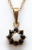 A 9ct gold sapphire and opal cluster pendant on a chain, 1.6g