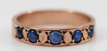 A 9ct rose gold cabochon cut sapphire half eternity ring, M, 2.7g