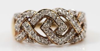 A 9ct gold diamond cross over dress ring, L, 3.3g