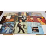 A collection of over thirty vinyl LP's together with seventeen singles, genre's to include but not