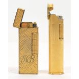 Alfred Dunhill of London; Two gold plated Dunhill pocket cigarette lighters, comprising a rollagas