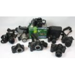 Eight cameras, to include, a Nikon D50 DSLR and a Minolta Dynax 7000i. (1 box)