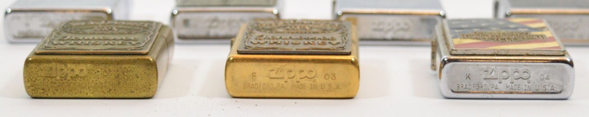 Zippo U.S.A; Seven Zippo pocket cigarette lighters, including advertising Jack Daniel's, Harley - Image 2 of 2