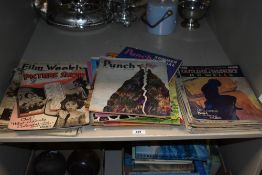 An assortment of vintage magazines and comics including titles of Punch 'Summer Special', 'Richard