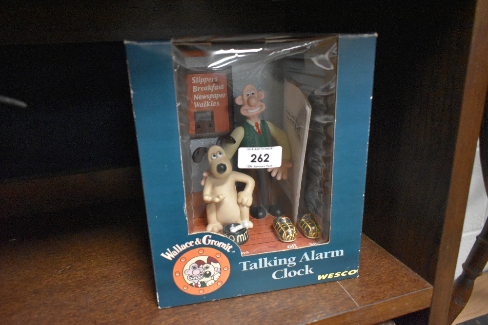 A boxed Wallace and Gromit talking alarm clock, featuring On-Off flashing message lights and