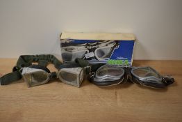 A pair of vintage stadium Mark 9 goggles, having laminated glass lenses and a leather surround, (