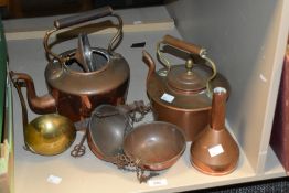 Two late 19th / early 20th century copper kettles, largest h27cm, sold together with a pair of