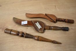 A set of three late 18th / early 19th century carved fruitwood knitting stick's, one having bone