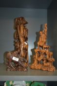 A large Chinese tree of life hard wood sculpture, hand carved depicting worthhog, snake's, giraffe's