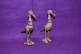 Two unusual animal skin bird figures, possibly Native American 19cm