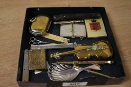 An interesting collection of propelling pencils, pocket knives, vesta cases, caddy spoon,