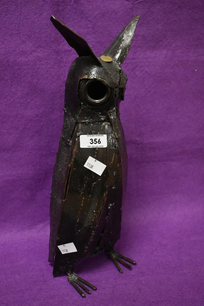 A striking modern welded metal long eared owl sculpture 38cm