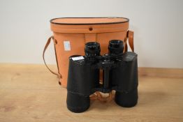 A Zenith Zeiss type 12 x 5 binoculars with brown leather carry case, stamped 'Japan' to base,