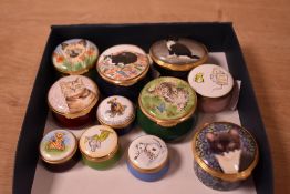 Eleven vintage miniature enamel lidded trinket box's depicting various characters, to include Walt