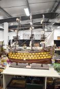 A large wooden model Naval Warship, HMS Victory 1805 on wooden stand, height 130cm, length 120cm,
