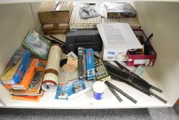 A shelf of N gauge Accessories and Track including Peco, Arnold Kits, many pieces of track etc