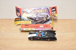 A Corgi Die-cast, 267 Batmobile on original card internal display stand with Operating
