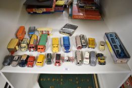 A collection of Dinky playworn Die-casts including 982 Pullmore Car Transporter in original blue and