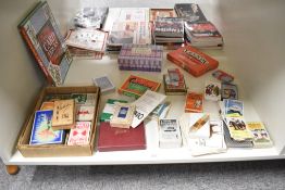 A shelf of vintage Card Games including Lexicon, Batting Aces, Temple Press War Planes,