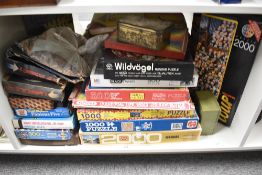 A shelf of mixed vintage Jig-saws including Waddington, MB, Victory, Falcon Star Patrol, all card