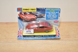 A Corgi die-cast, 335 4.2 Litre Jaguar E Type 2+2, in red, on original card base with plastic bubble